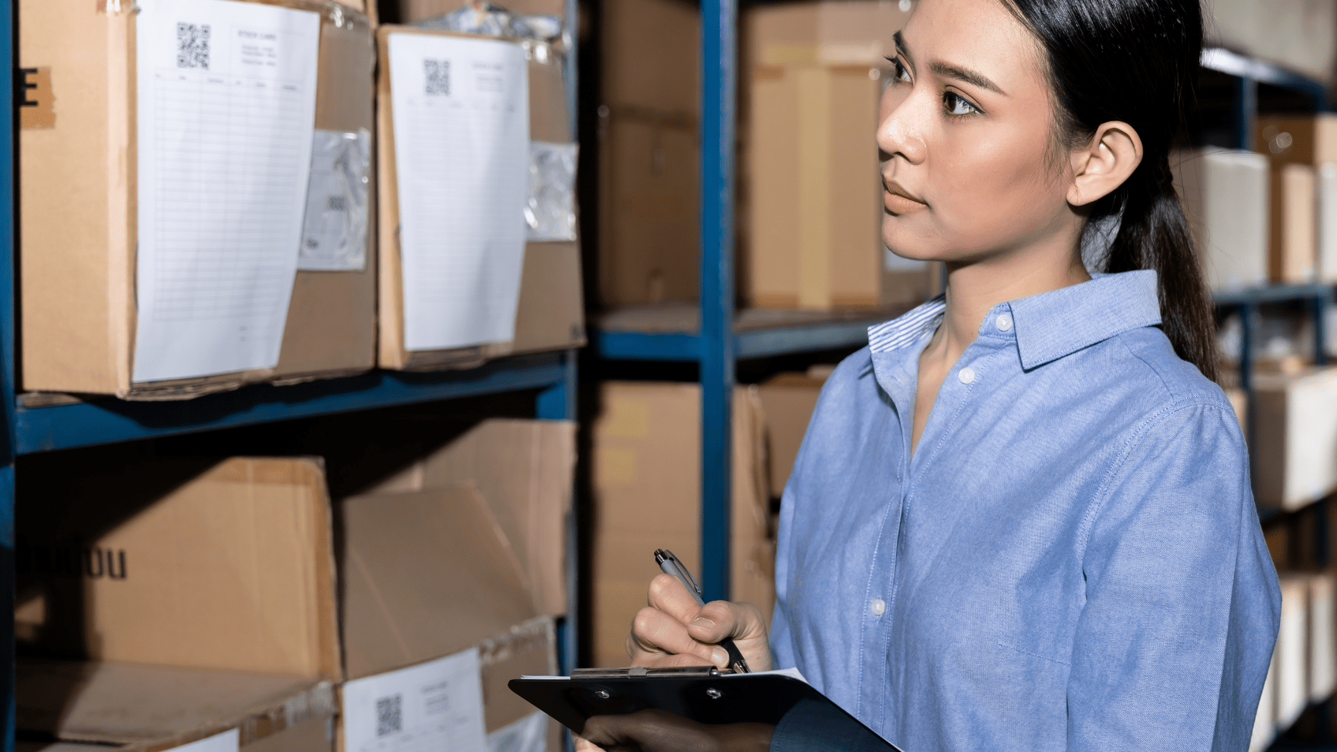 Woman taking inventory with a clipboard