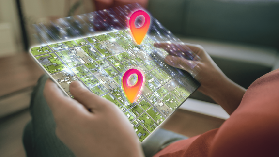 A coffee barista at Scooter's Coffee is happy now that fulfillment mistakes have been eliminated with Geo Analytics